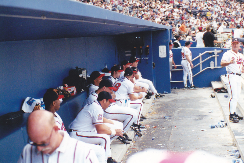 At right, first base coach Glenn Hubbard stares directly at me as I take a photo.
